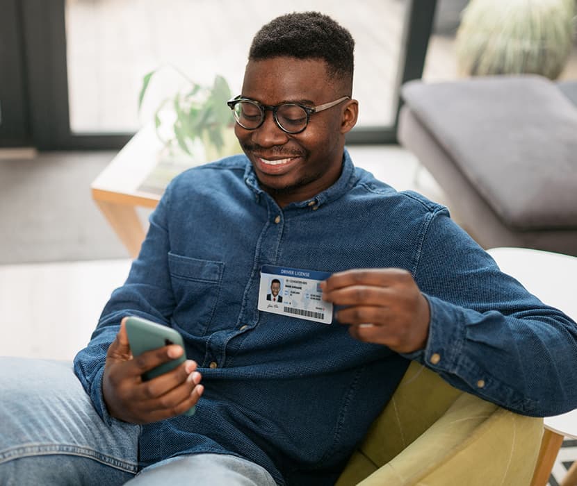 A Man showing his id card